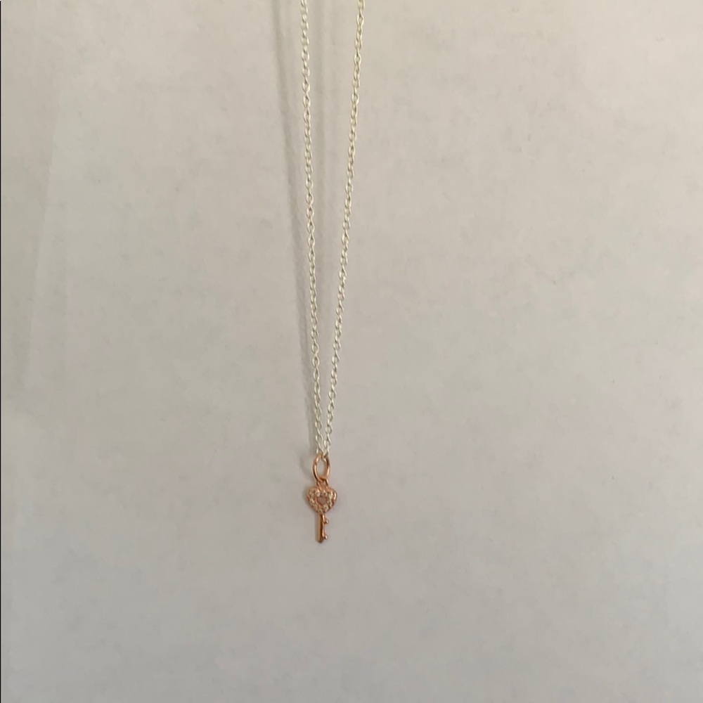 Rose gold and silver key necklace with small gems
